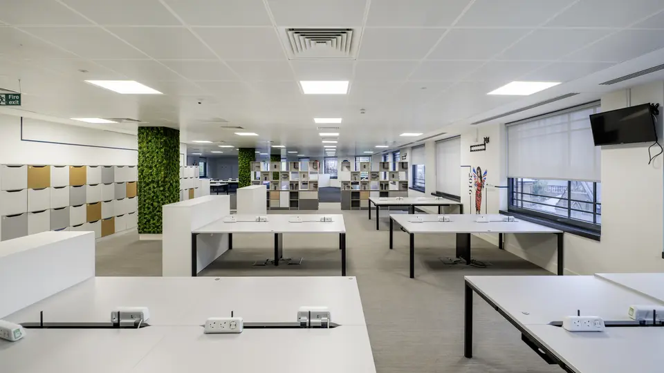 Fitted office floor with bench desking and planted column